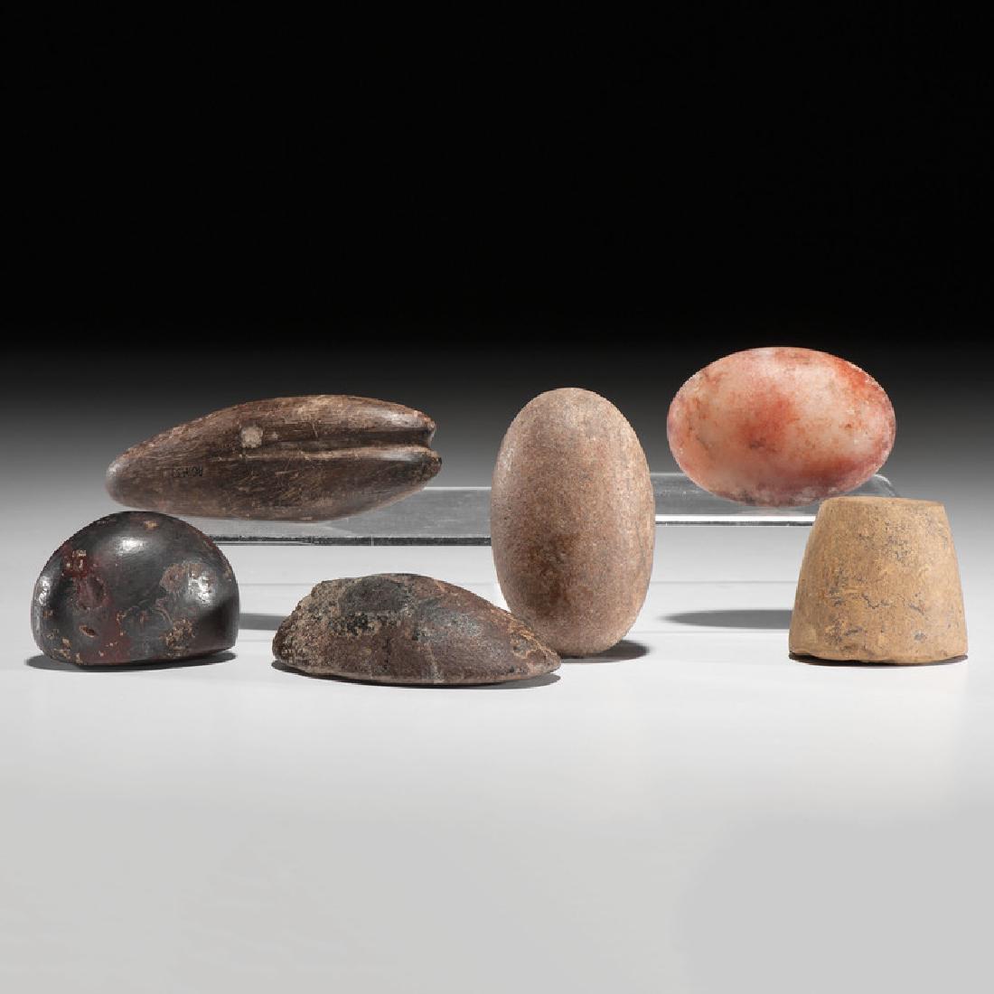 A Variety of Ground and Polished Cones, Hemispheres,: Archaic - Early Woodland Period, 8000-100 B.C. lot of 6, longest 4 in. Provenance: Publications: Gerber, Art, The Art Gerber Story, 2007, pg. 103, fig. 7.043 Gerber, Art, The Art Gerber Story, 2007, p