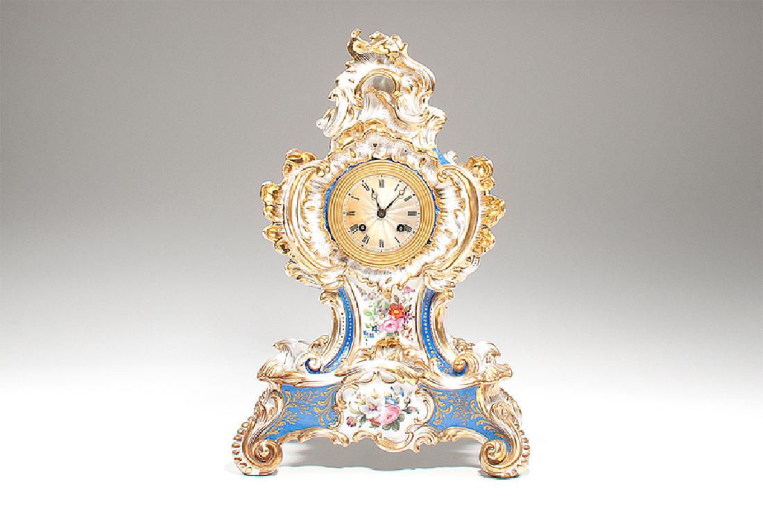 Jacob Petit Porcelain Mantel Clock: French, late 18th-early 19th century. A Rococo-style porcelain clock on separate stand framed by scrolling acanthus in gilded enamel, featuring polychrome floral and bird motifs. Marked JP in