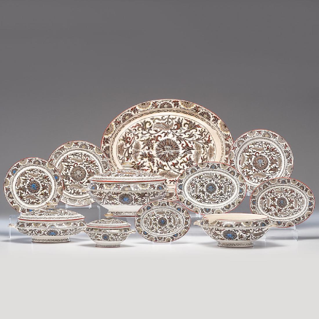 Minton Dinner Service, Humber Pattern: English, ca 1880. A sixty-five piece Minton dinner service in the brown Humber pattern, including a well and tree platter, a round serving dish, two sauce tureens, a soup tureen, three vegetable dishe