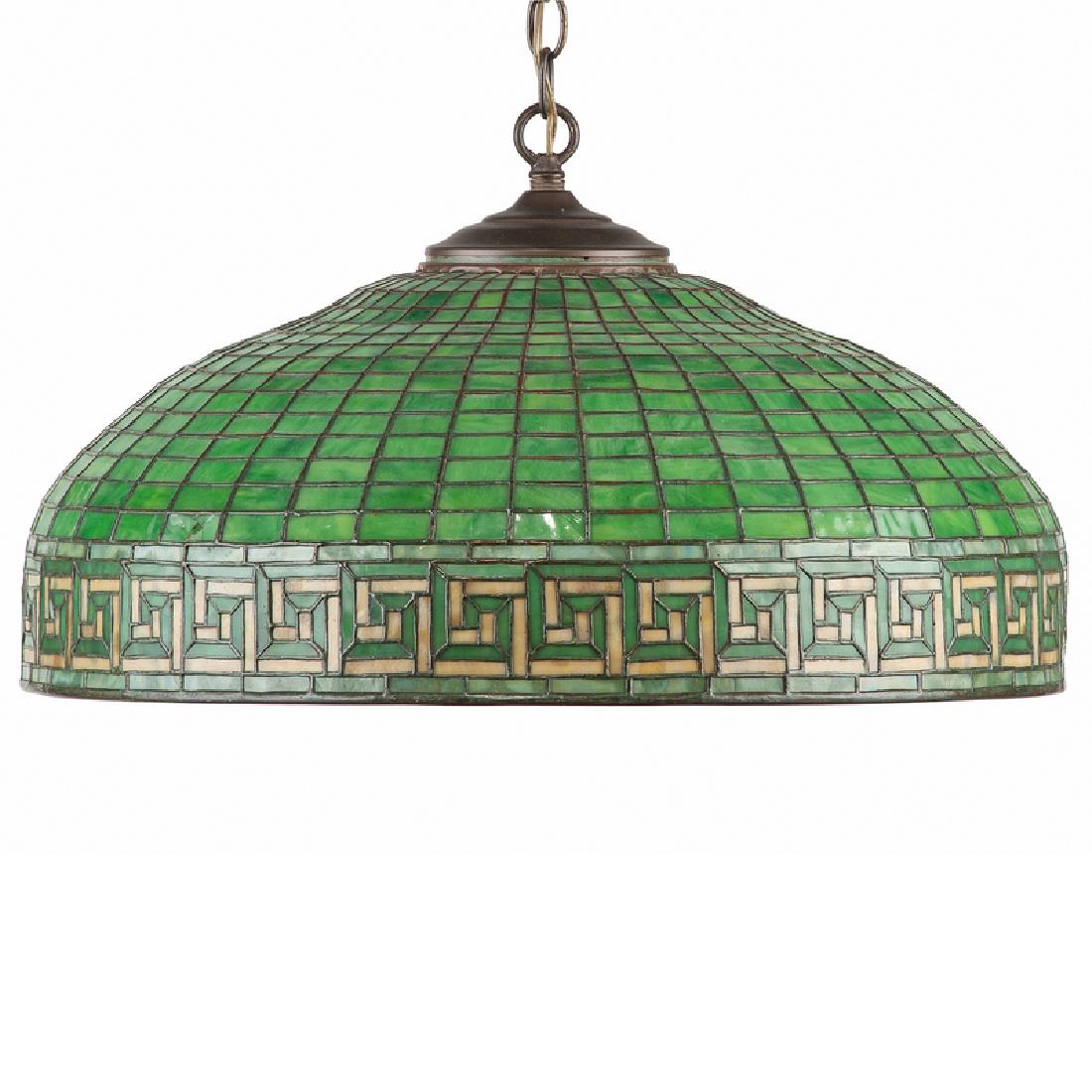 Tiffany Studios Hanging Shade in Greek Key Pattern: American, 20th century. A green leaded glass hanging lamp shade from Tiffany Studios New York, in the Greek Key pattern. Interior of shade impressed Tiffany Studios New York 1907; dia. 22, ht. 9 in.