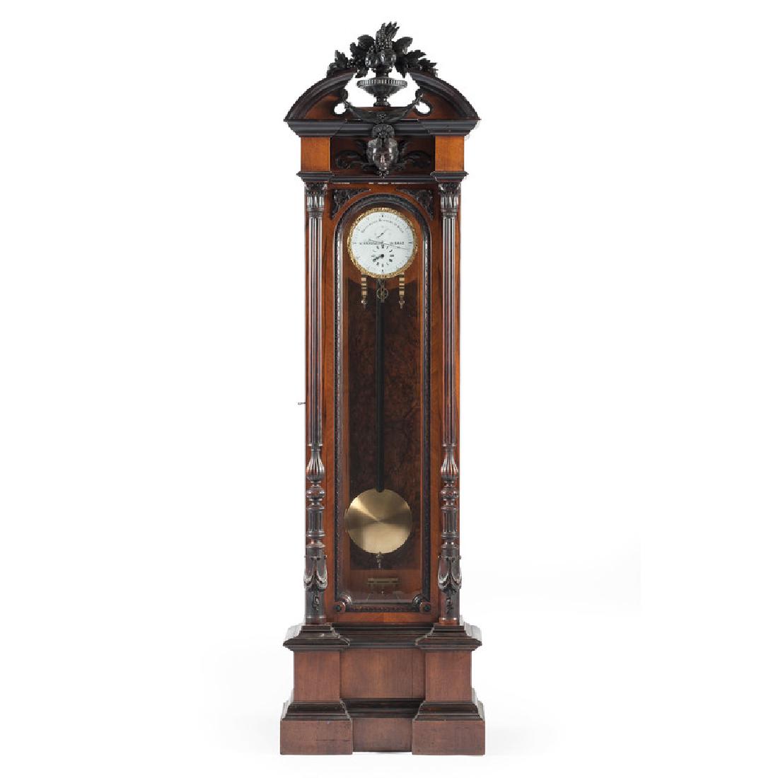 Fine German Jeweler's Regulator Clock, Dial Signed "W.: German, late 19th-early 20th century, possibly retailed to Krause in the Czech city of Zatec (Saaz). A regulator tall case clock in mixed hardwoods and mahogany veneers, having an arched and broken pe