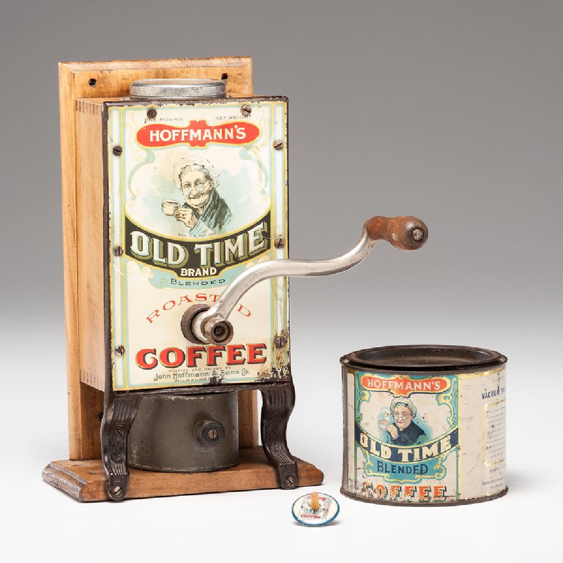 Arcade Advertising Mill for the John Hoffmann & Sons: American. An advertising coffee mill with lithographed tin face made by Arcade for Hoffmann's, with matching Hoffmann's Old Time Blended Coffee tin, PLUS Hoffmann's advertising spinning top; mill ht. 
