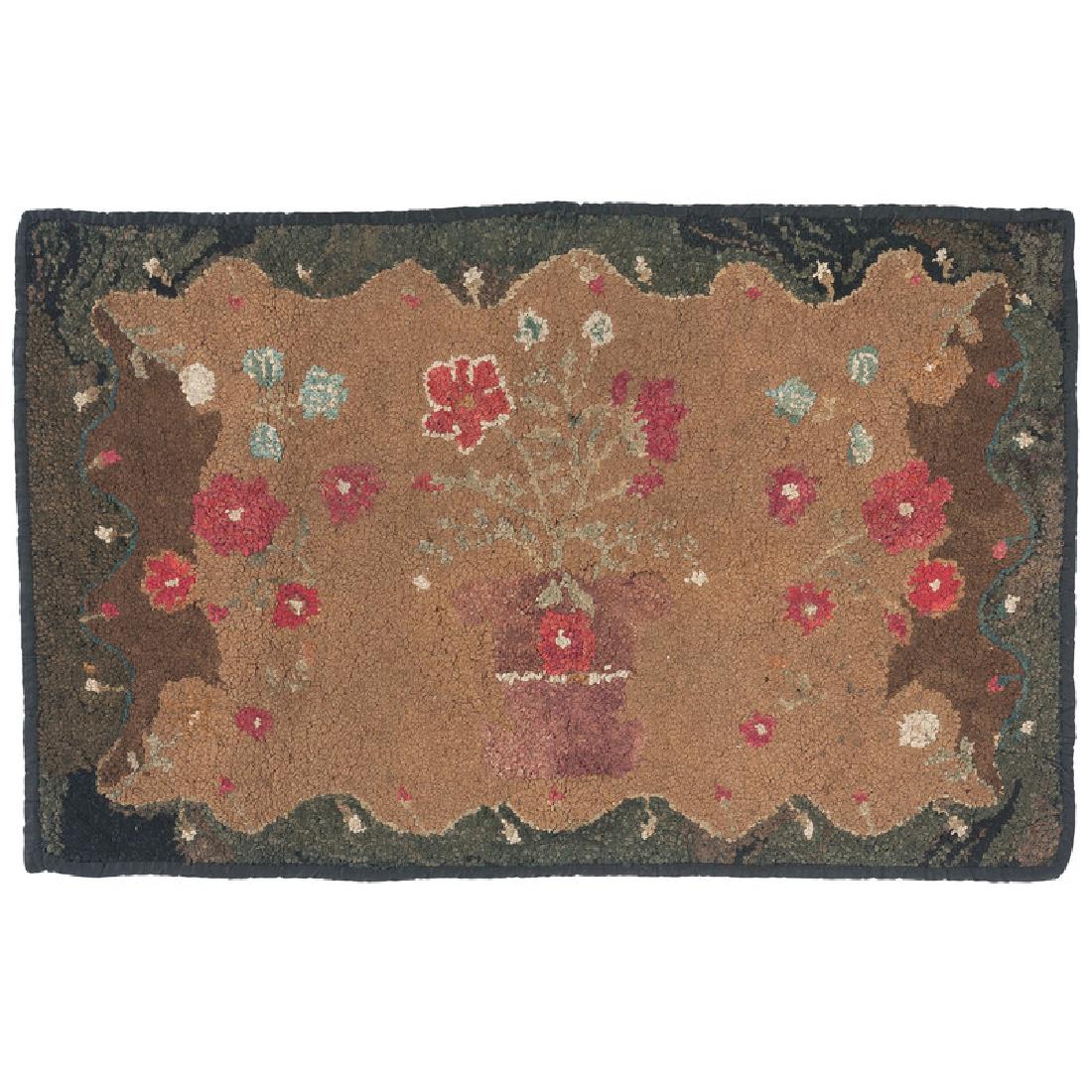 Hooked Rug with Urn of Flowers: American, 1860-1935. A hooked rug with central urn of flowers; 39.875 x 25.875 in. Provenance: Sold by the Art Institute of Chicago