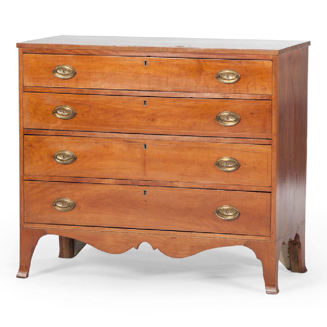 Federal Cherry Chest of Drawers: American (Pennsylvania), 19th century. A Federal chest of drawers in cherry, having a rectangular surface, over four dovetailed drawers with banding inlay, brass escutcheons and pulls, over an inlaid 
