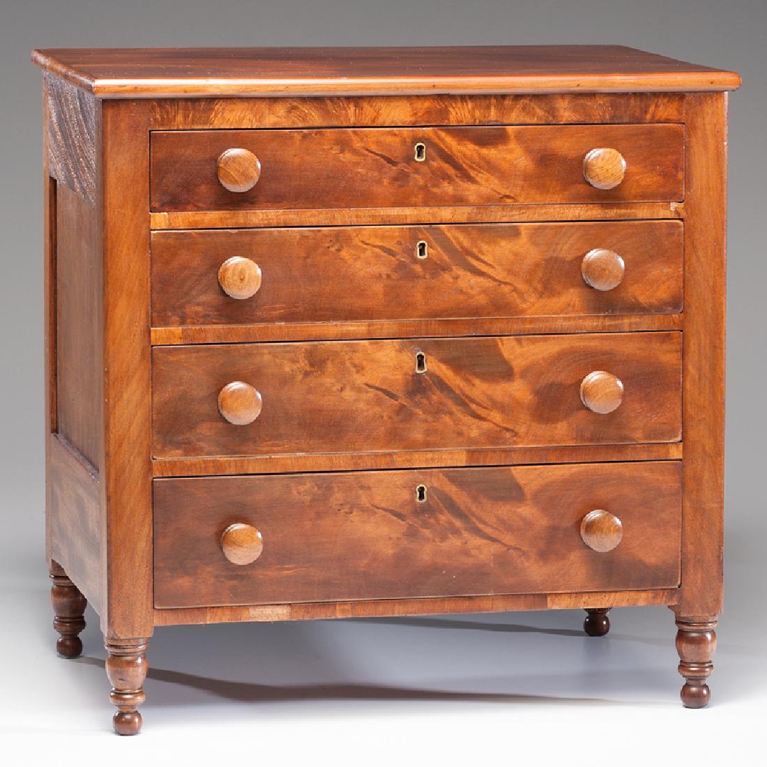 Miniature Sheraton Chest of Drawers: American (probably Midwest), 19th century. A miniature chest of drawers in mahogany and poplar secondary, having a rectangular surface over four graduated dovetailed drawers with brass escutcheons and