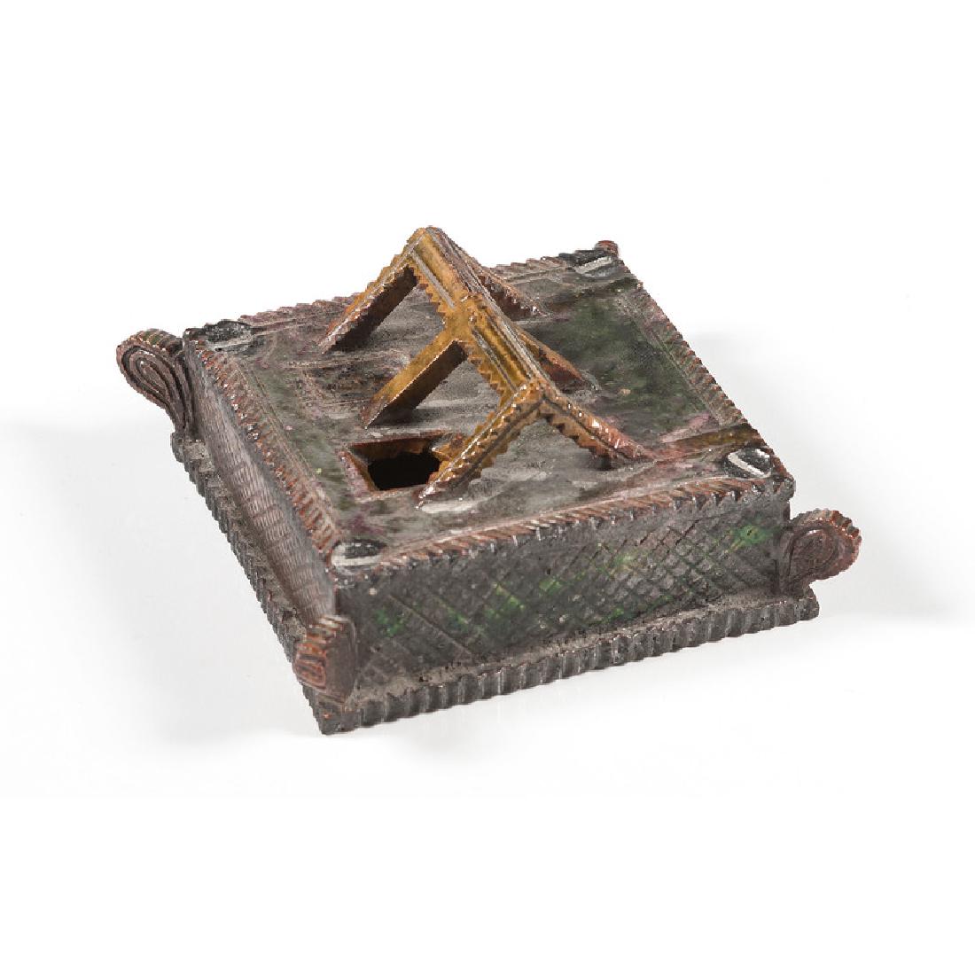 George Ohr Pottery Inkwell: American, 20th century. A redware inkwell, inscribed Ohr / Biloxi to underside; ht. 1.75, wd. 3.75, dp. 3.75 in. Provenance: Property from the Inventory of Rex Stark
