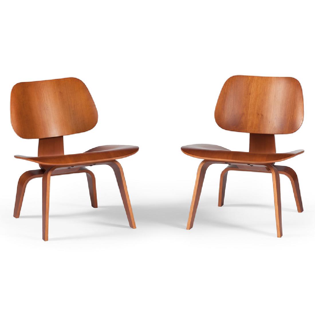 Charles Eames DCW Plywood Chairs: American, 20th century. A pair of mid-century modern chairs designed by Charles and Ray Eames for Herman Miller, in molded plywood, with Herman Miller Eames label on the underside of each chair; ht. 2