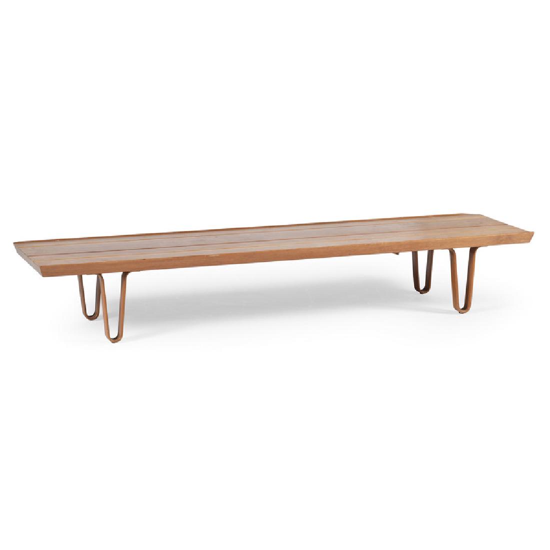 Dunbar Coffee Table: American, 20th century. A mid-century modern Edward Wormley for Dunbar coffee table, in walnut, with Dunbar Furniture Corporation and Dunbar metal tag on underside; ht. 11.75, wd. 72, dp. 19 in.