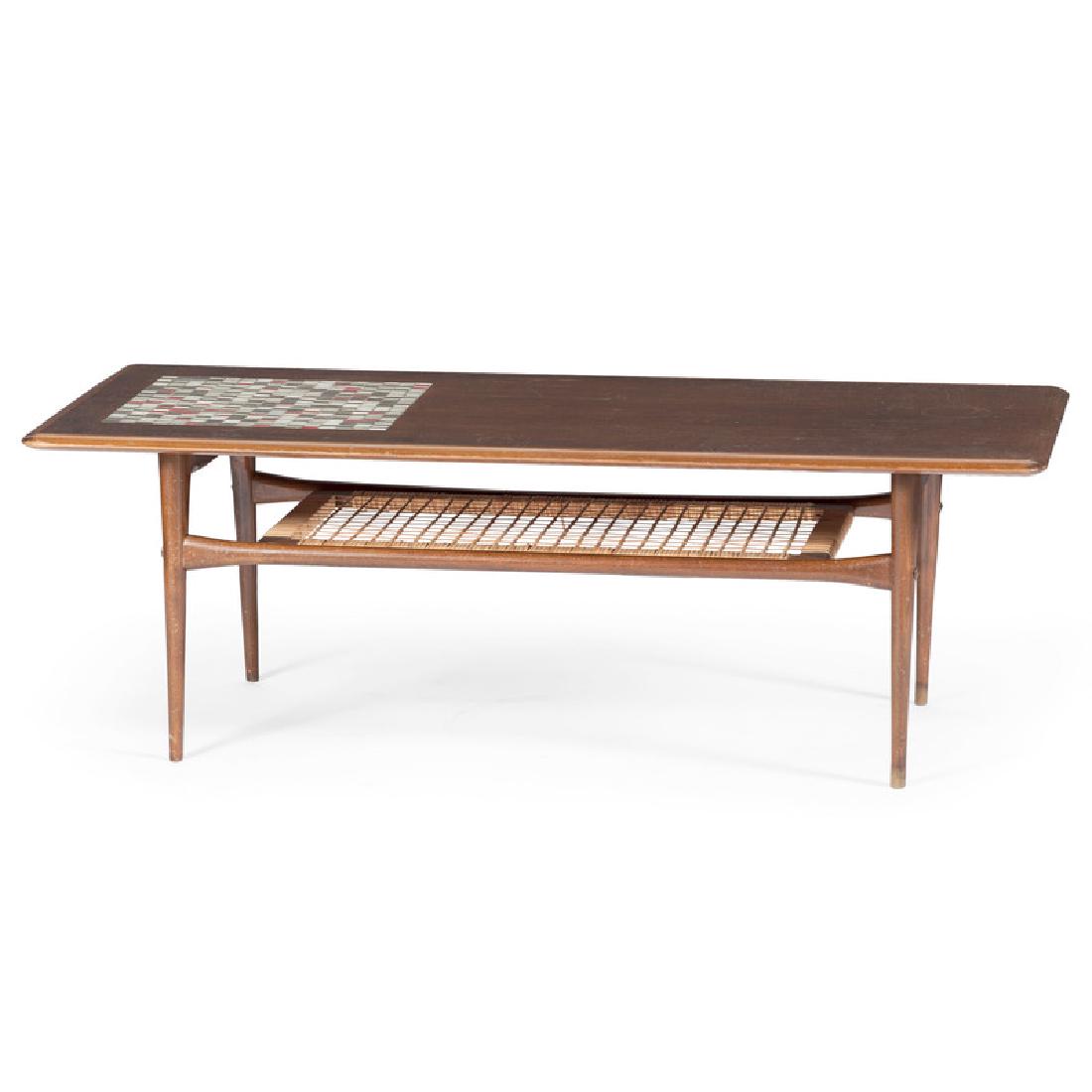 Silkeborg Coffee Table: Danish, 20th century. A mid-century modern coffee table attributed to CFC Silkeborg Co., having inset tiles to one side of top and lower woven shelf; ht. 16, wd. 48.5, dp. 22 in.
