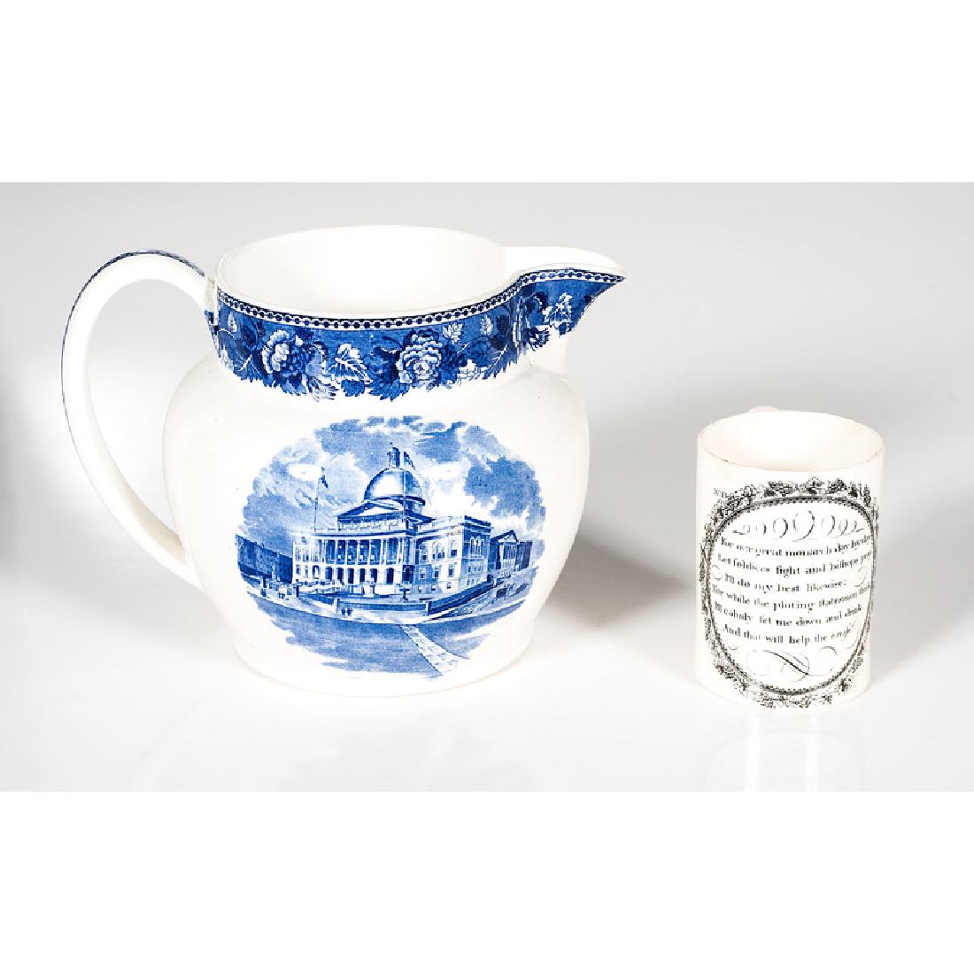 Wedgwood Pitcher and Creamware Mug: English, 19th century. A Wedgwood pitcher depicting the Boston State House, marked, and a creamware mug with poem inscription; pitcher ht. 6.75 in.