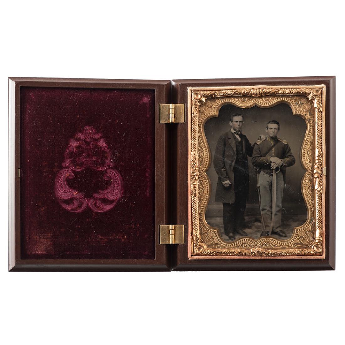 Quarter Plate Ruby Ambrotype of an Armed Union Soldier: Quarter Plate Ruby Ambrotype of an Armed Union Soldier and Father Quarter plate ruby ambrotype featuring an armed Union cavalryman wearing a mounted services jacket complete with shoulder scales, stan