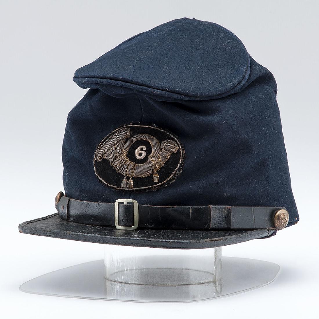 Commercial Federal Officer's Cap: Commercial Federal Officer's Cap Dark blue wool with 5" disk. Painted square leather visor bound with single row of stitching. 1.5" hand stitched Morocco leather sweatband with polished cotton lining.