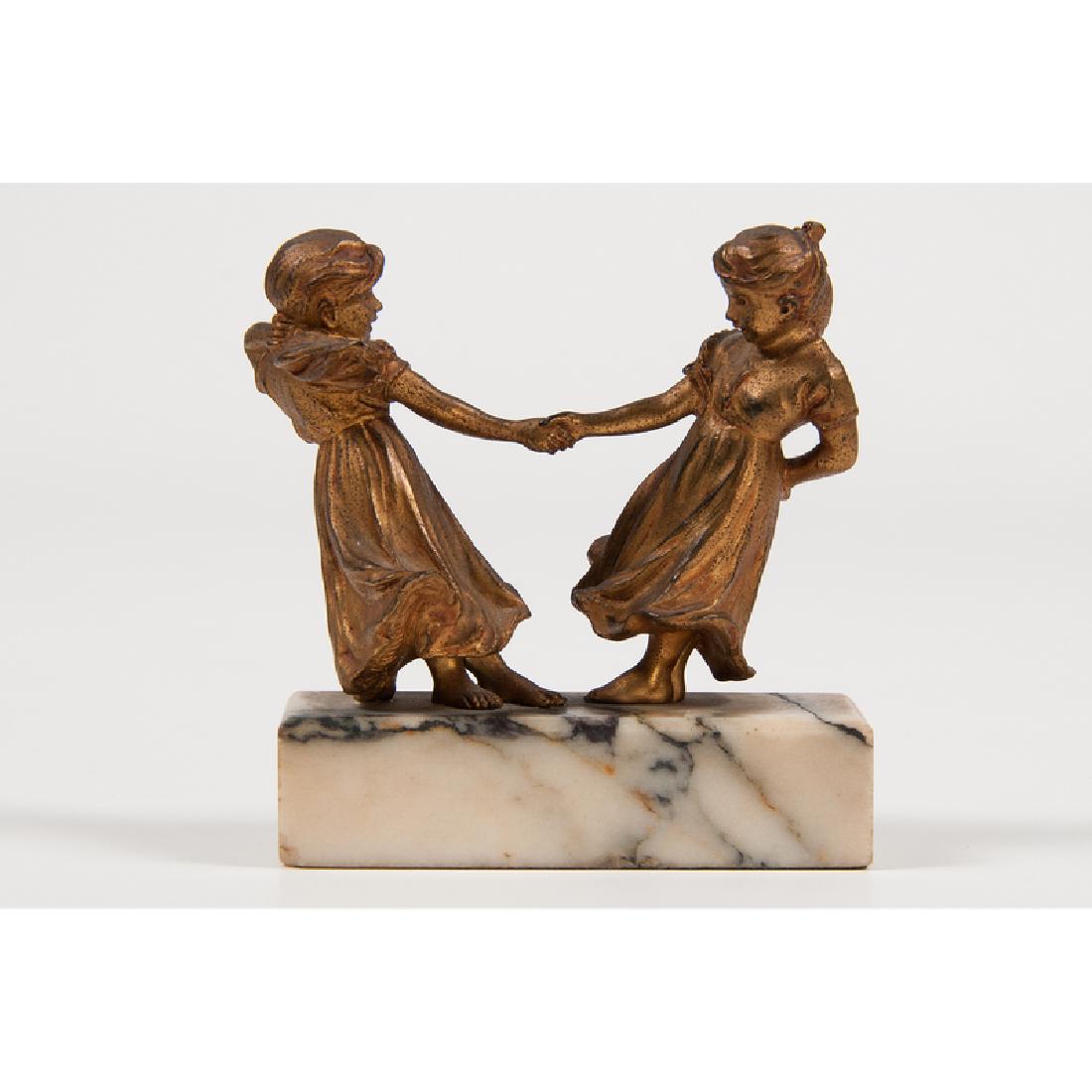 Carl Kauba (Austrian, 1865-1922) Bronze: Two Girls Dancing early 20th century signed on one girl's skirt numbered 626 on other girl's skirt on marble base ht. 4.5, wd. 4.25, dp. 2 in.