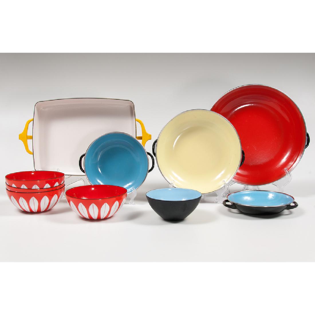 Mid-Century Modern Enameled Kitchenwares: Continental, mid-20th century. Ten enameled kitchenware pieces, including four Cathrineholm bowls with red and white pattern, marked for maker and Norway on underside, and with original box; five hand