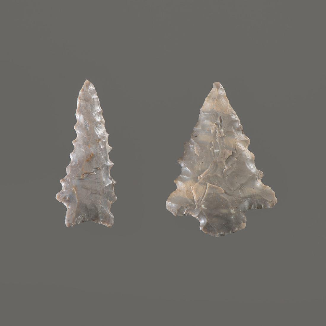 Two Kirk Corner Notched Points, Longest 2 in.: Early Archaic Period, 10,000-8000 B.C. Perry County, Indiana [AG.57] lot of 2, longest 2 in. Provenance: Collection History: Gerber Collection Number: AG.57 Found near Derby, Indiana by Edward Scheide