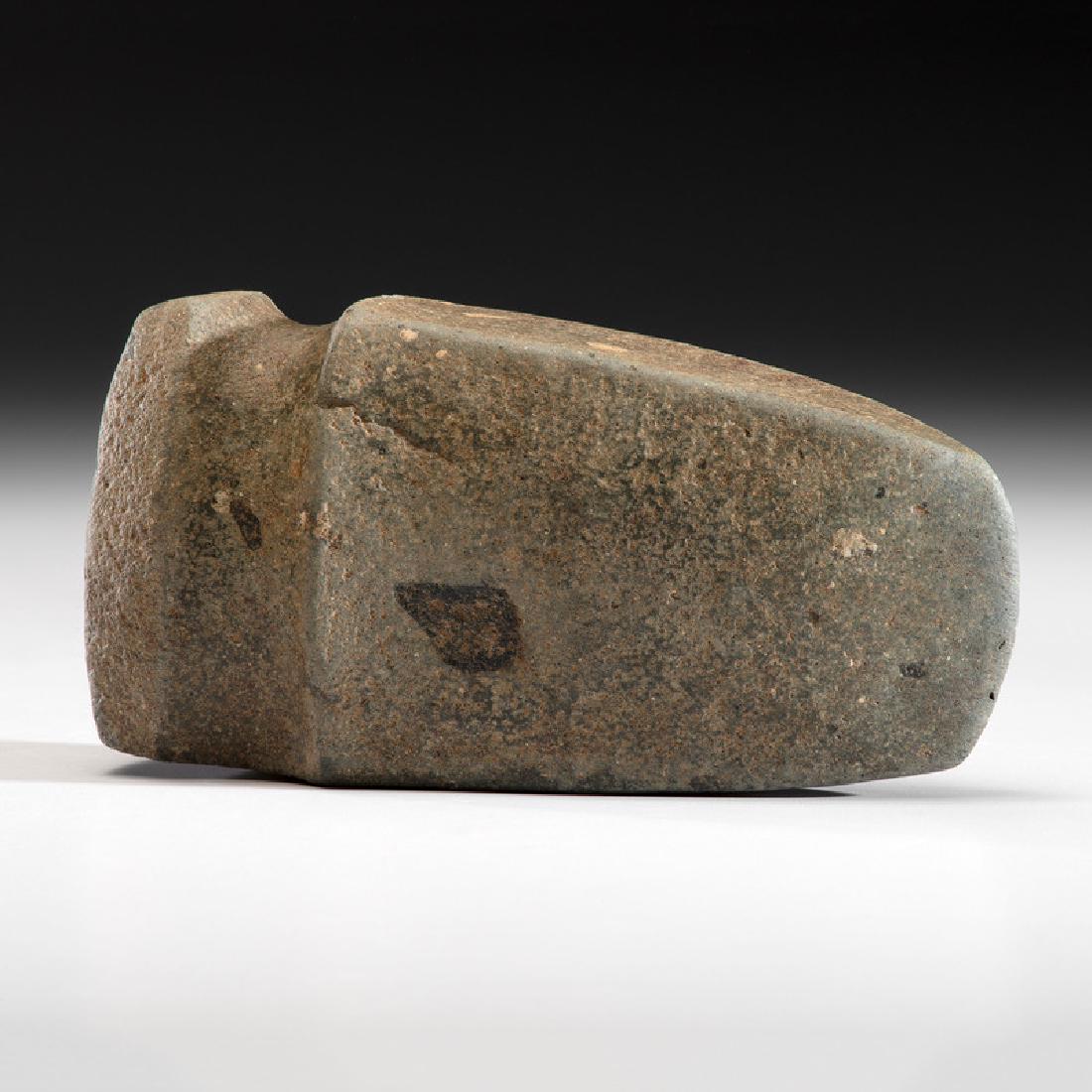 A Porphyry 3/4 Grooved Axe, 7 in.: Late Archaic Period, 4000-1000 B.C. length 7 in. This green granite porphyry axe has excellent polish on all surfaces. Provenance: Published: Gerber, Art, The Art Gerber Story, 2007, pg. 341, f. 7.28