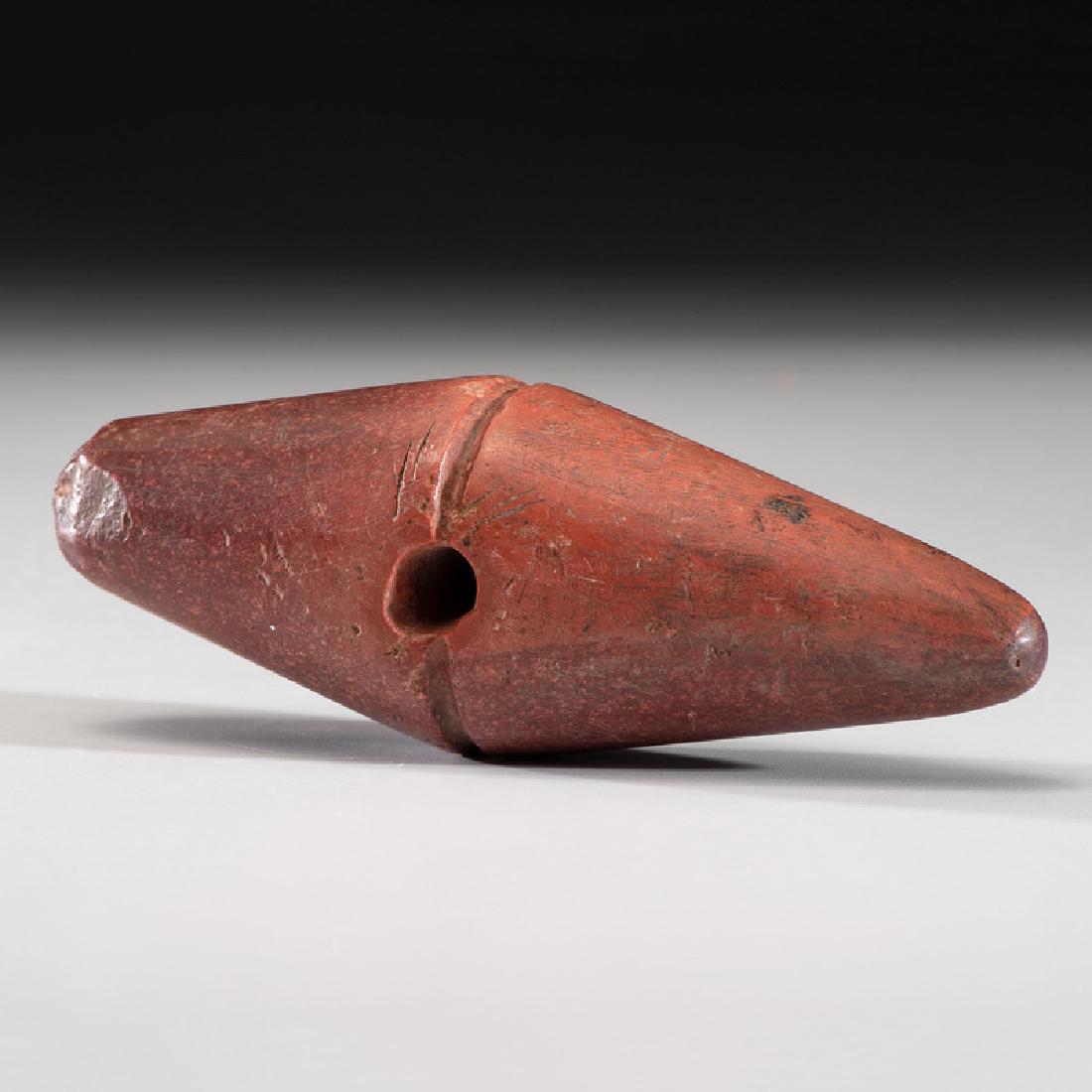 A Catlinite Grooved War Club, 5-1/2 in.: Historic Period, post A.D. 1500 length 5-1/2 in.