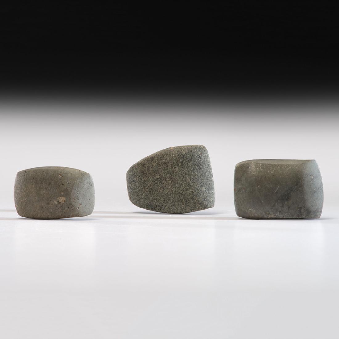 Three Small Celts, Longest 2-1/4 in.: Middle Woodland Period, 100 B.C. - A.D. 500 lot of 3, longest 2-1/4 in. Provenance: Collection History: Gerber Collection Numbers: AG.H25, AG.H23, AG.H24