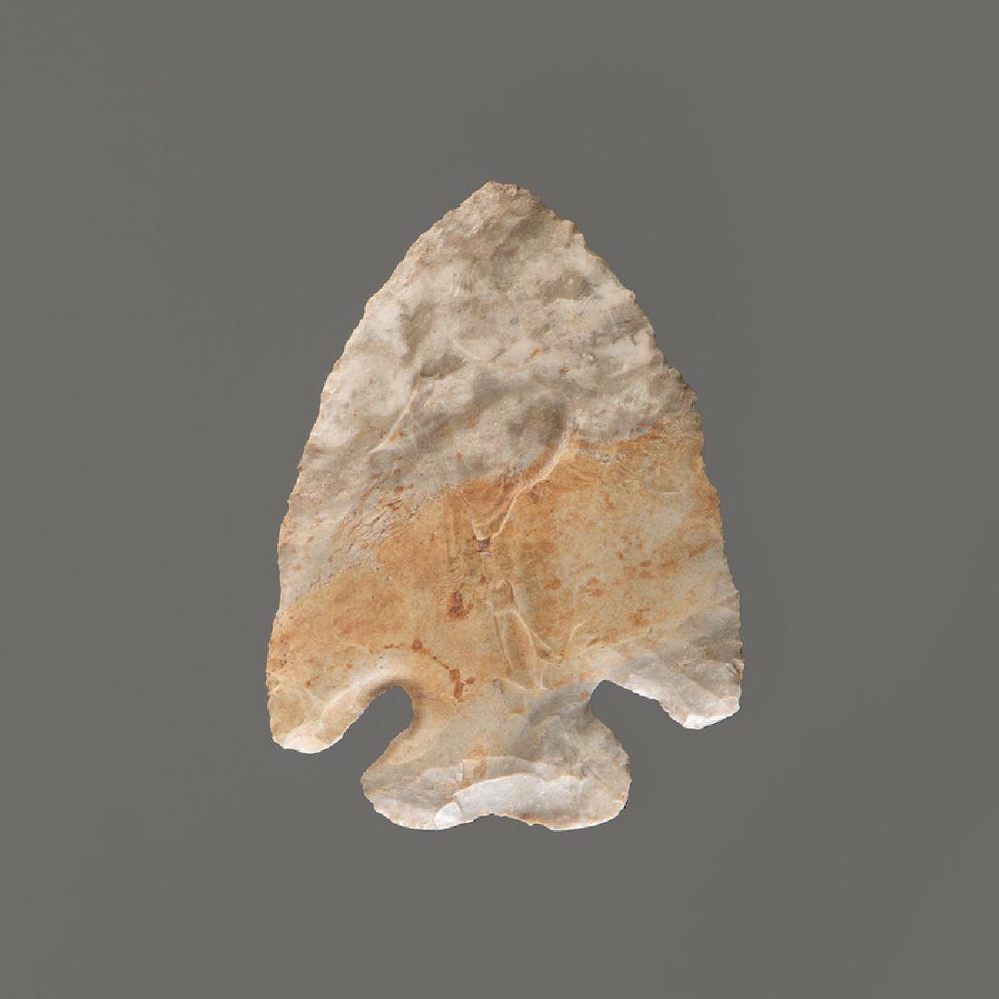 A Thebes Point, 2-1/2 in.: Early Archaic Period, 10,000-8000 B.C. length 2-1/2 in. Made from a multi-colored flint.