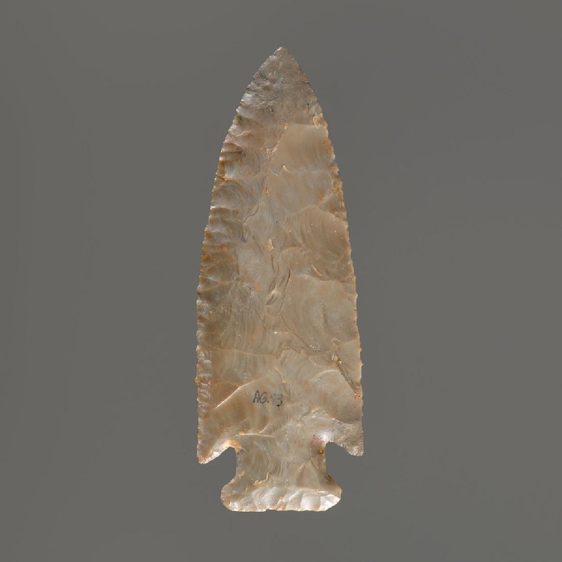 A Harden Point, 5 in.: Late Paleo - Early Archaic Period, 8000-6000 B.C. Expertly restored tip and one ear. length 5 in. Provenance: Collection History: Gerber Collection Number: AG.43 Published: Gerber, Art, The Art Gerber