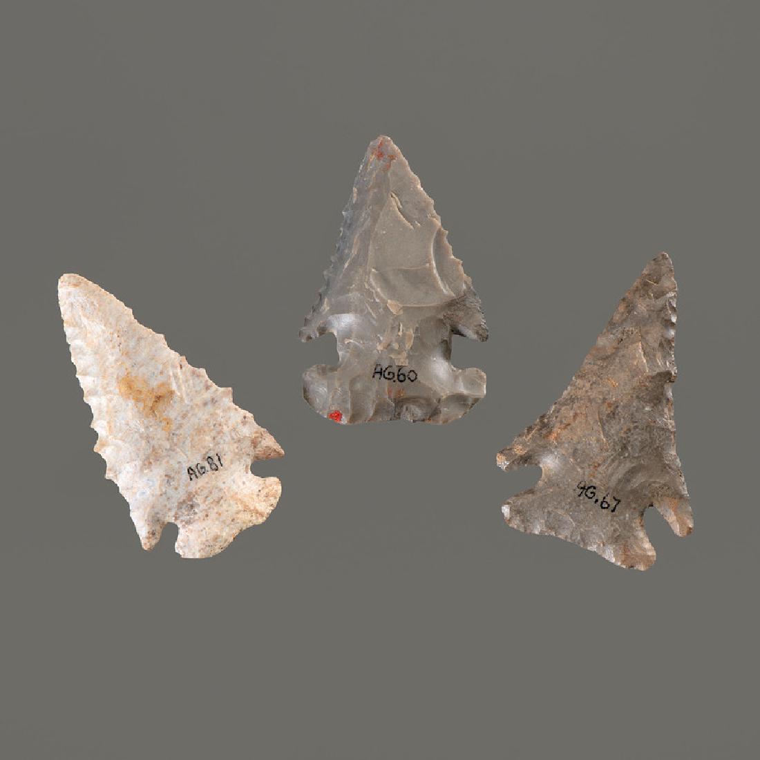 Three Archaic Points, Longest 2-1/4 in.: Archaic Period, 8000-500 B.C. Perry County, Indiana All expertly restored. lot of 3, longest 2-1/4 in. Provenance: Collection History: Gerber Collection Numbers: AG.81, AG.67, AG.60 Published: Gerber,
