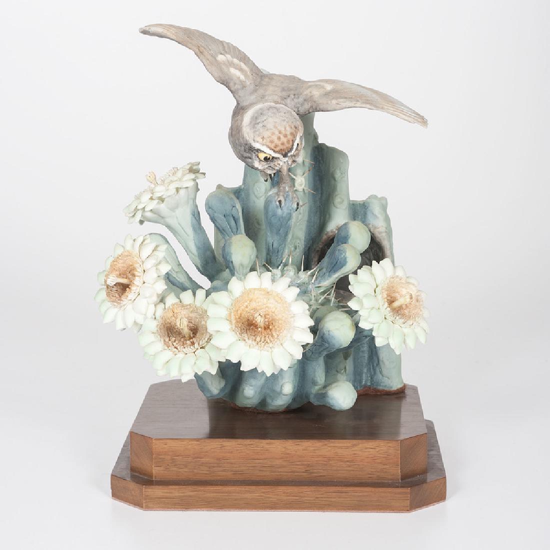 Royal Worcester Dorothy Doughty Moonlight Elf Owl: English, 20th century. A painted porcelain moonlight elf owl perched on a giant saguaro cactus, modeled by Dorothy Doughty (1892-1962) for her American Birds series, and produced by Royal Worcester , 