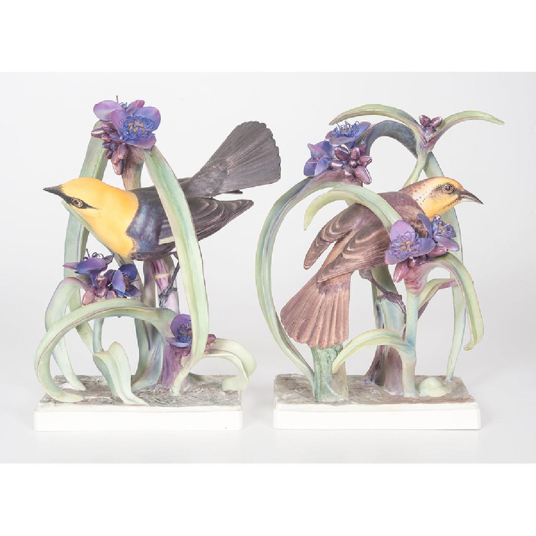 Royal Worcester Dorothy Doughty Yellow-headed Blackbird: English, first half 20th century. A pair of porcelain yellow headed blackbirds, male and female, perched on spiderwort, modeled by Dorothy Doughty (1892-1962) for her American Birds series, and produc