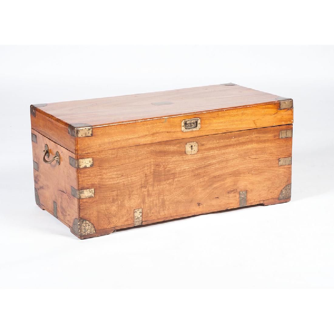 English Brass Mount Captain's Chest: English, 19th century. A captain's chest in mahogany, having a lift top surface with open interior, brass corner mounts and side handles; ht. 16, wd. 35, dp. 18 in.