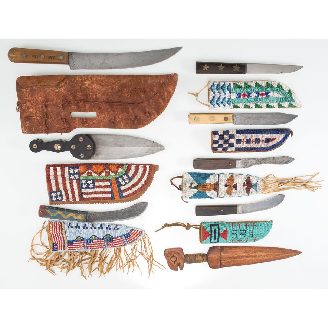 Lot of Eight Costume Plains Knives: Lot consists of seven costume knives in Plains Indian-style with beadwork in patriotic and pictorial motifs. Handle materials are of wood and bone with brass mountings.