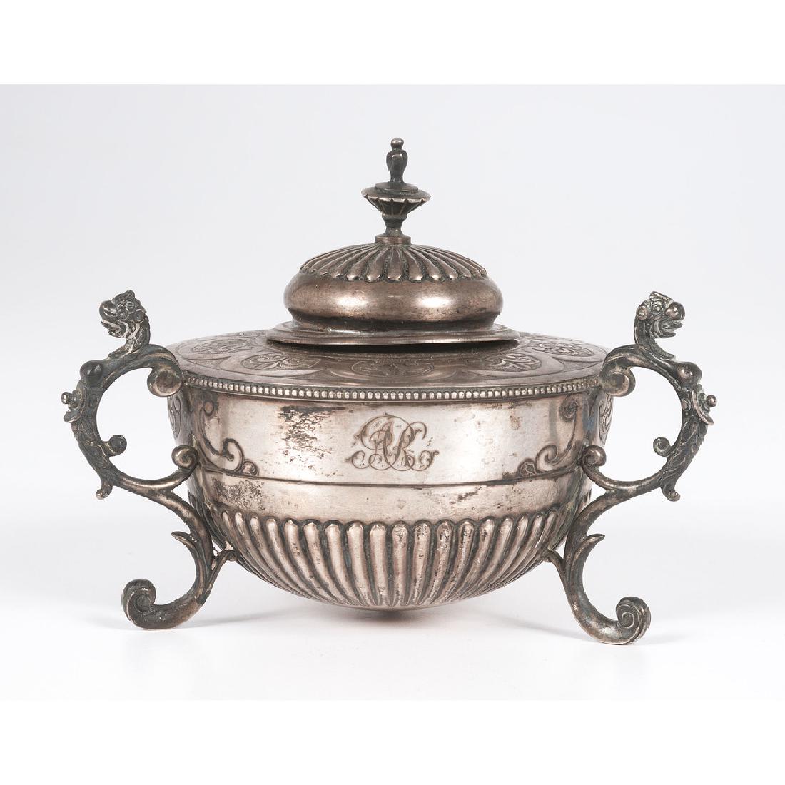 Watherston-retailed Sterling Inkwell by Jackson & Deere: English (London), 1893. A sterling silver inkwell with gadrooning and engraved decoration, with figural handles on scrolled feet, made by William Henry Jackson & Peter Henderson Deere and retailed by