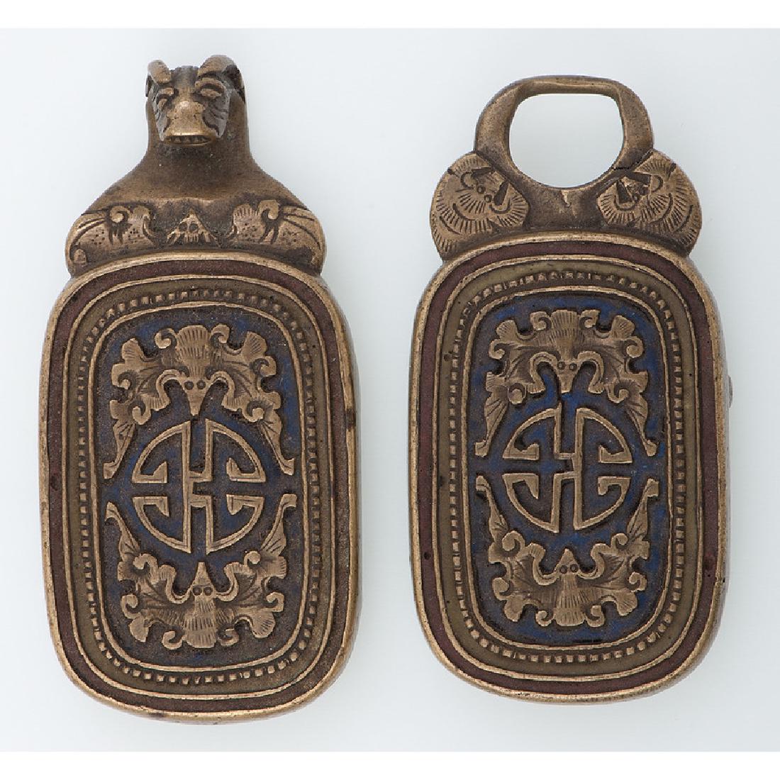 Chinese Belt Buckle with Fu Bats and Shou Symbols: Chinese. A two-piece bronze buckle with Fu bats and Shou symbols; lg. 3 in. (each piece). Provenance: 