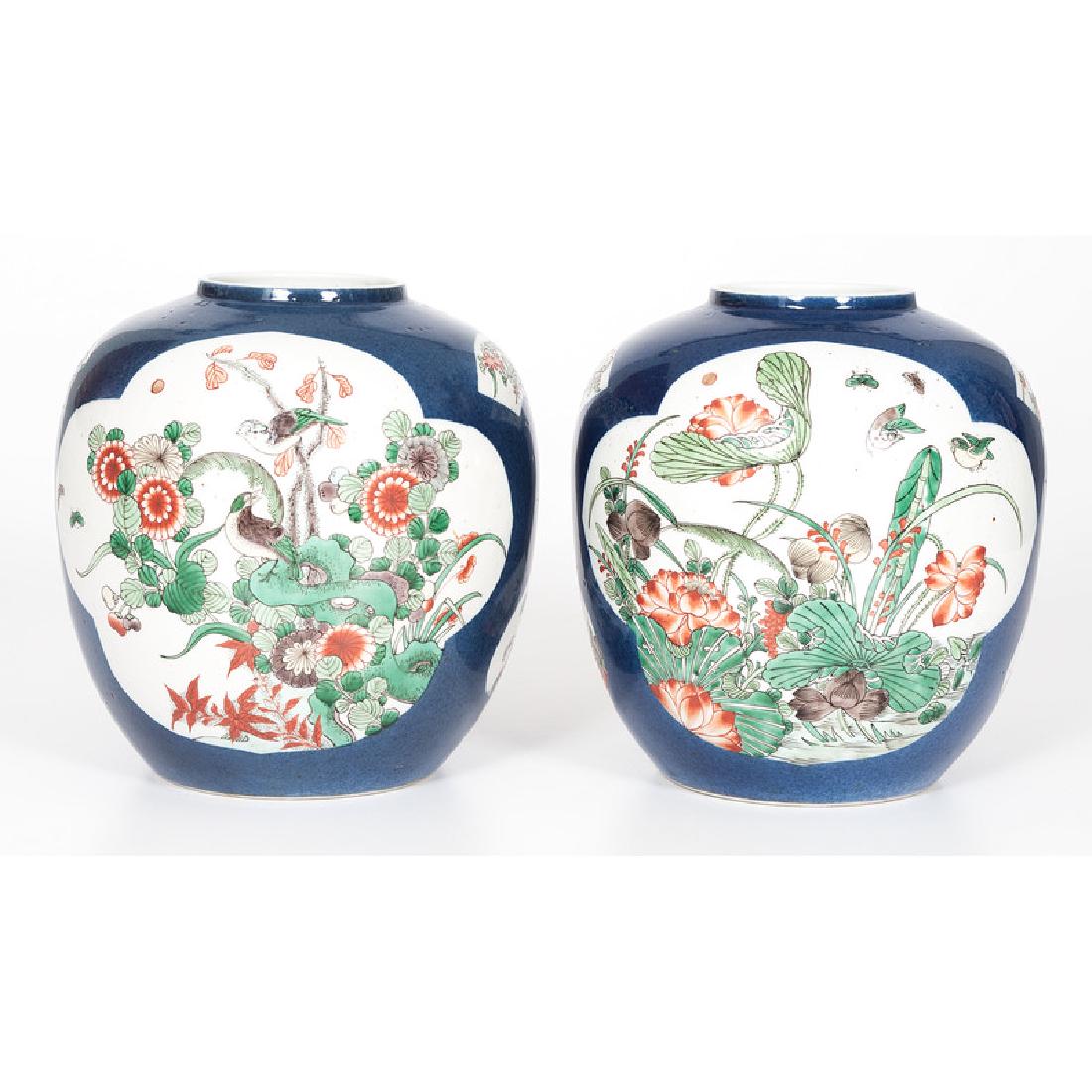 Kangxi-style Famille Verte Ginger Jars: Chinese. A pair of Kangxi-style famille verte and powder blue ginger jars, each with reserves of florals and birds, double circle underglaze blue mark to bottom; ht. 9 in. (each). Provenance:&nb