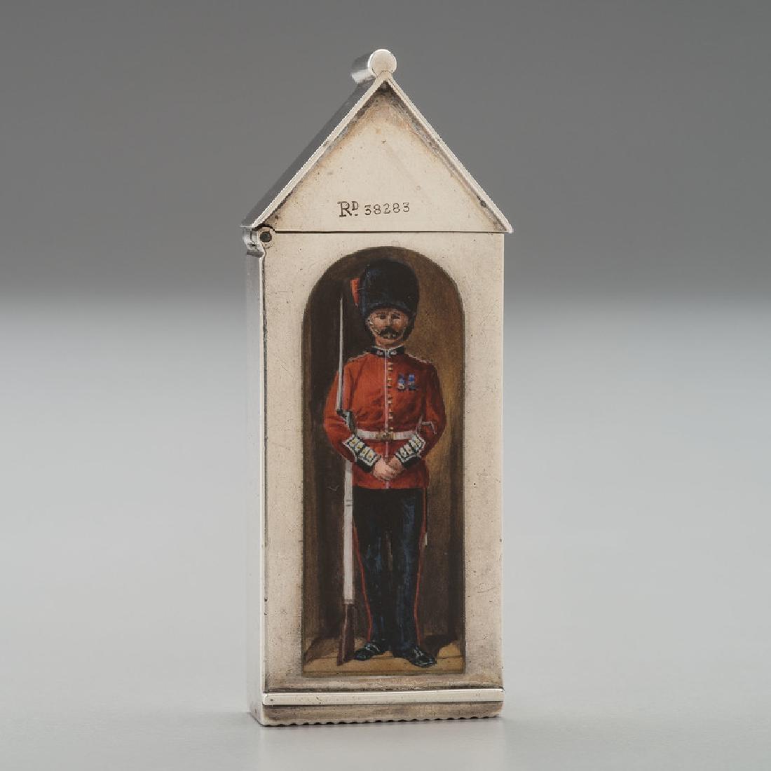 Sampson Mordan Sterling Sentry Box Match Safe: English (London), 1895. A sterling match safe by Sampson Mordan & Co. in the form of a sentry box, with an enameled panel depicting the sentry inside, with match strike to underside, and full hallmark