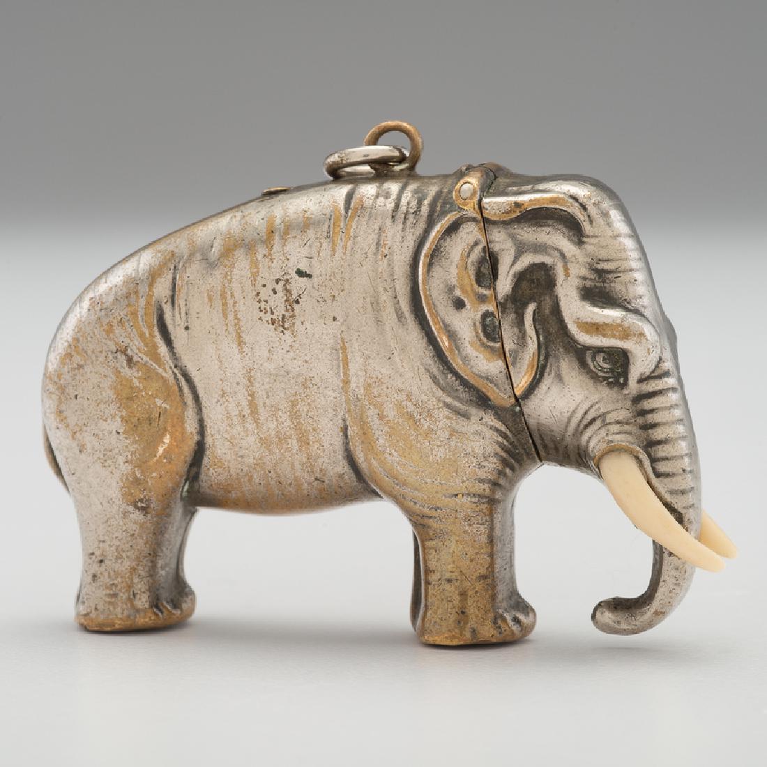 Elephant Figural Silverplate Match Safe: Late 19th-early 20th century. A silverplate match safe in the form of an elephant with protruding tusks, with match strike to top, unmarked; ht. 2.25, wd. 1.5, dp. 0.75 in. Provenance: Property from t