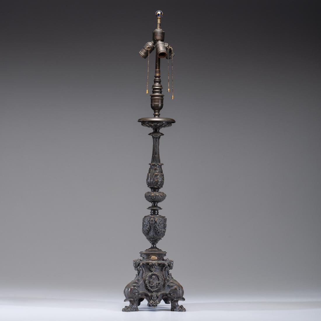 Tiffany Studios Bronze Italianate Lamp Base: American (New York), late 19th-early 20th century. A Tiffany Studios bronze Baroque-style lamp base, marked on underside of foot Tiffany Studios / New York / 654; oah. 40 in.