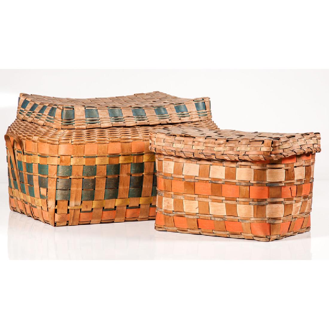 Iroquois Polychrome Lidded Storage Baskets: Native American (Iroquois). Two polychrome woven storage baskets, one lidded with lug handles; larger ht. 13, lg. 23, wd. 17 in. Provenance: Property from the Hermann Gleeson Collection of Americana, 