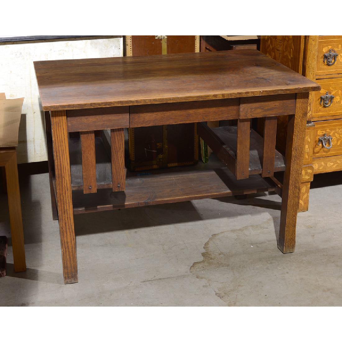 Arts and Crafts Desk: American, 20th century. An Arts and Crafts oak writing desk; ht. 30, wd. 42.25, dp. 26.25 in.
