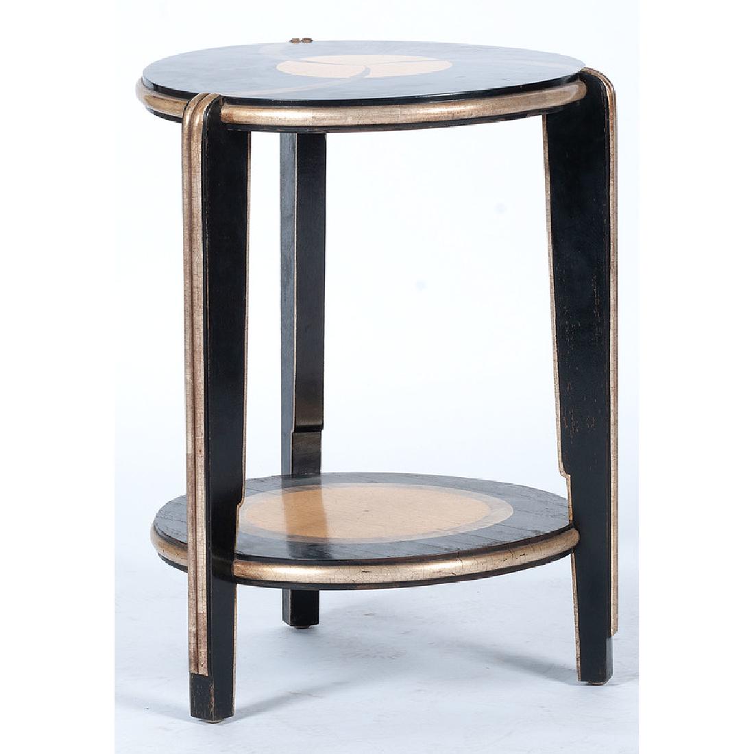 French Fern Stand: French, 20th century. A ebonized and gilt-decorated fern stand, having a round surface over secondary shelf, rising on shaped legs; ht. 25, dia. 17.5 in. Provenance: Property Sold to benefit the Art A