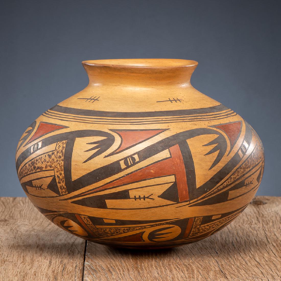 Rachel Namingha Nampeyo (Hopi, 1903-1985) Pottery Jar: rounded form and painted with an airy migration pattern on body and dragonflies around shoulder; signed on base, height 7.25 in. x diameter 9.5 in. mid-20th century