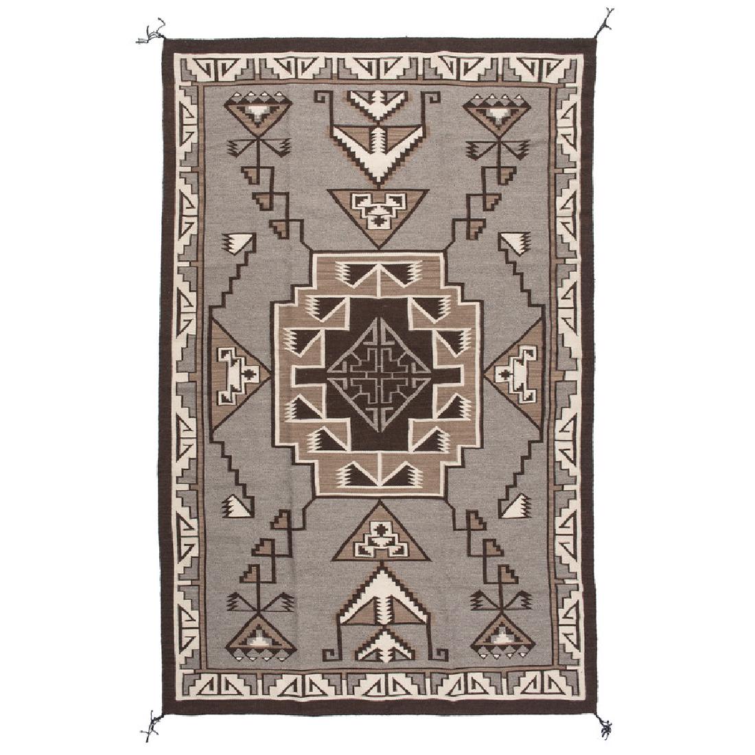 Linda Nez (Dine, act. 1970s) Award Winning Navajo Two: finely woven of natural churro wool and designed with a modified storm pattern, 47 x 74 in. Included is a 2013 First Place ribbon from the Gallup Inter-Tribal Indian Ceremonial, and identification pap