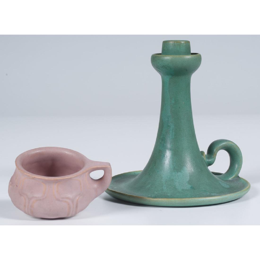 Teco Candlestick and Cup: American, late 19th-early 20th century. A matte glaze chamber candlestick and diminutive cup by Teco, both marked; candlestick ht. 6.5 in.