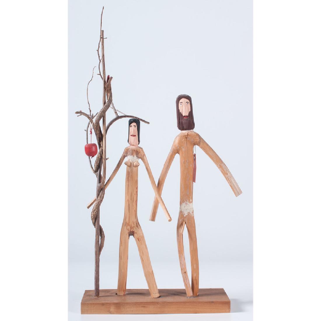 Kentucky Folk Art Sculpture by Edd Lambdin & Carl: American (Kentucky), 20th century. Two outsider folk art carvings: a whimsical painted lizard by Edd Lambdin, and an Adam and Eve sculpture with a snake and apple by Carl McKenzie. Lizard signed under