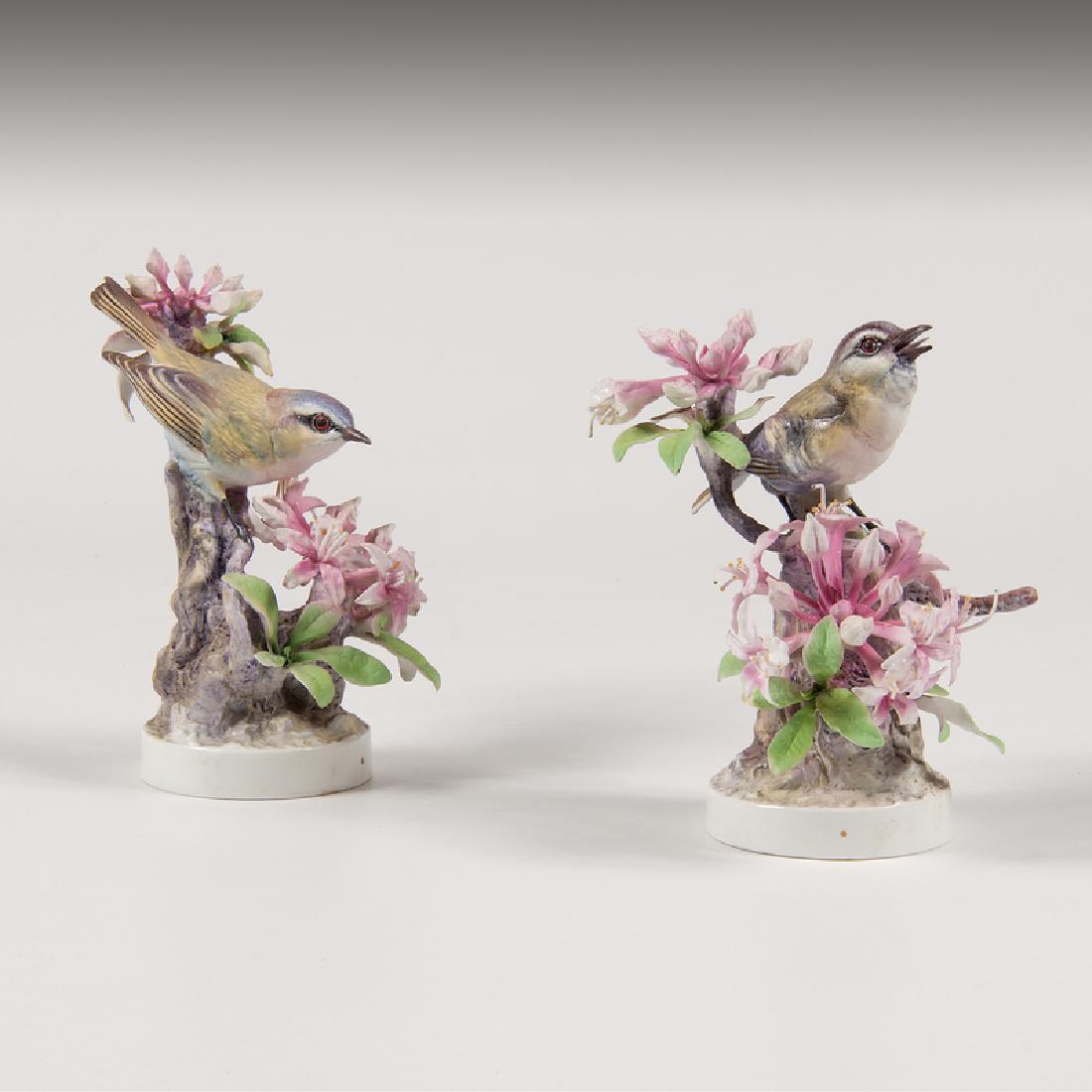 Royal Worcester Dorothy Doughty Red-Eyed Vireo Figures: English, mid-20th century. Two Royal Worcester painted porcelain figures by Dorothy Doughty (1892-1962), each a red-eyed vireo amongst flowers, with species, artist signature, and factory marks on und