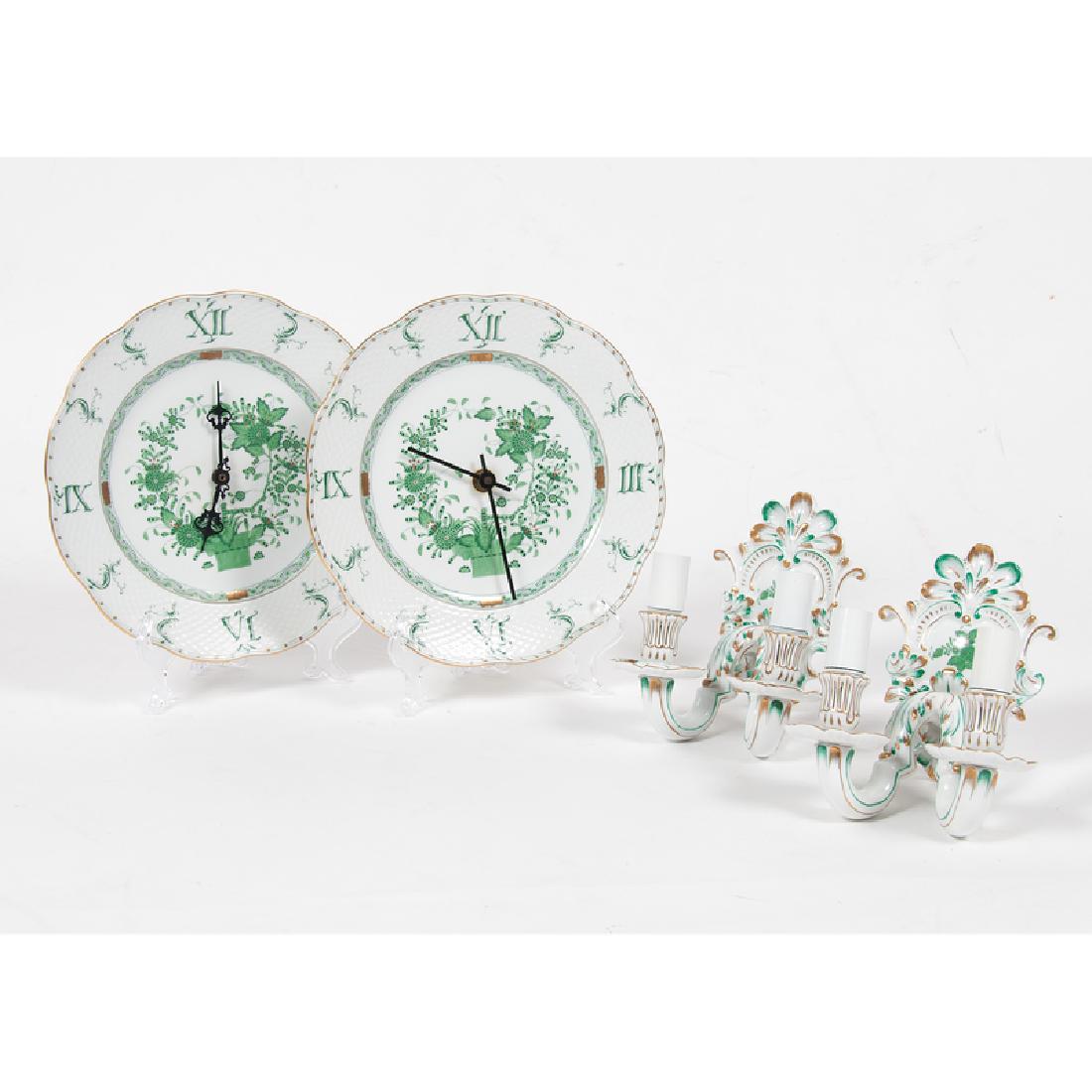 Herend Wall Clocks and Sconces, Chinese Bouquet and: Hungarian, late 20th century. Four pieces of Herend wall decor marked for maker on underside, including two wall clocks in the Indian Basket pattern and marked 527/FV , and two two-armed wall sconces