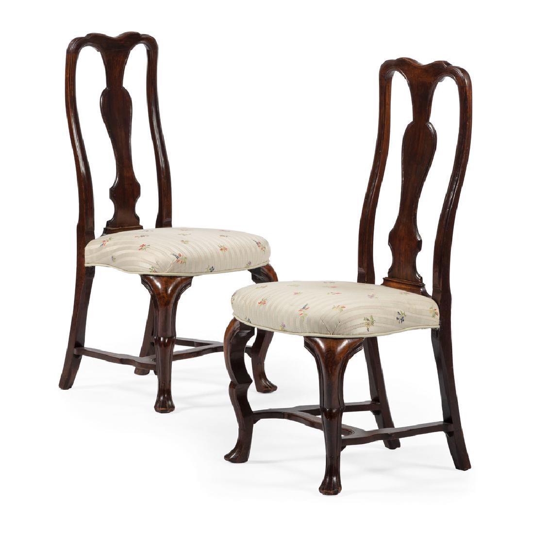 Queen Anne Black Walnut Side Chairs: American (Hudson River Valley), ca 1730. A rare pair of Queen Anne side chairs in black walnut, each with a shaped crest and splat, both highlighted with decorative trench or bead molding that carries