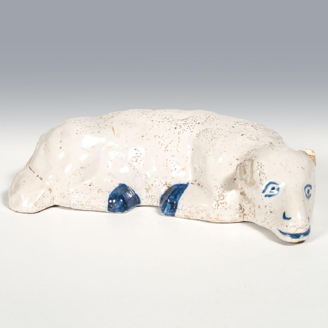 Pennsylvania Stoneware Lamb Doorstop, Attributed to: American, 20th century. A Bristol-slip glazed stoneware lamb doorstop, attributed to Pfaltzgraff Pottery ; ht. 2, lg. 7 in.