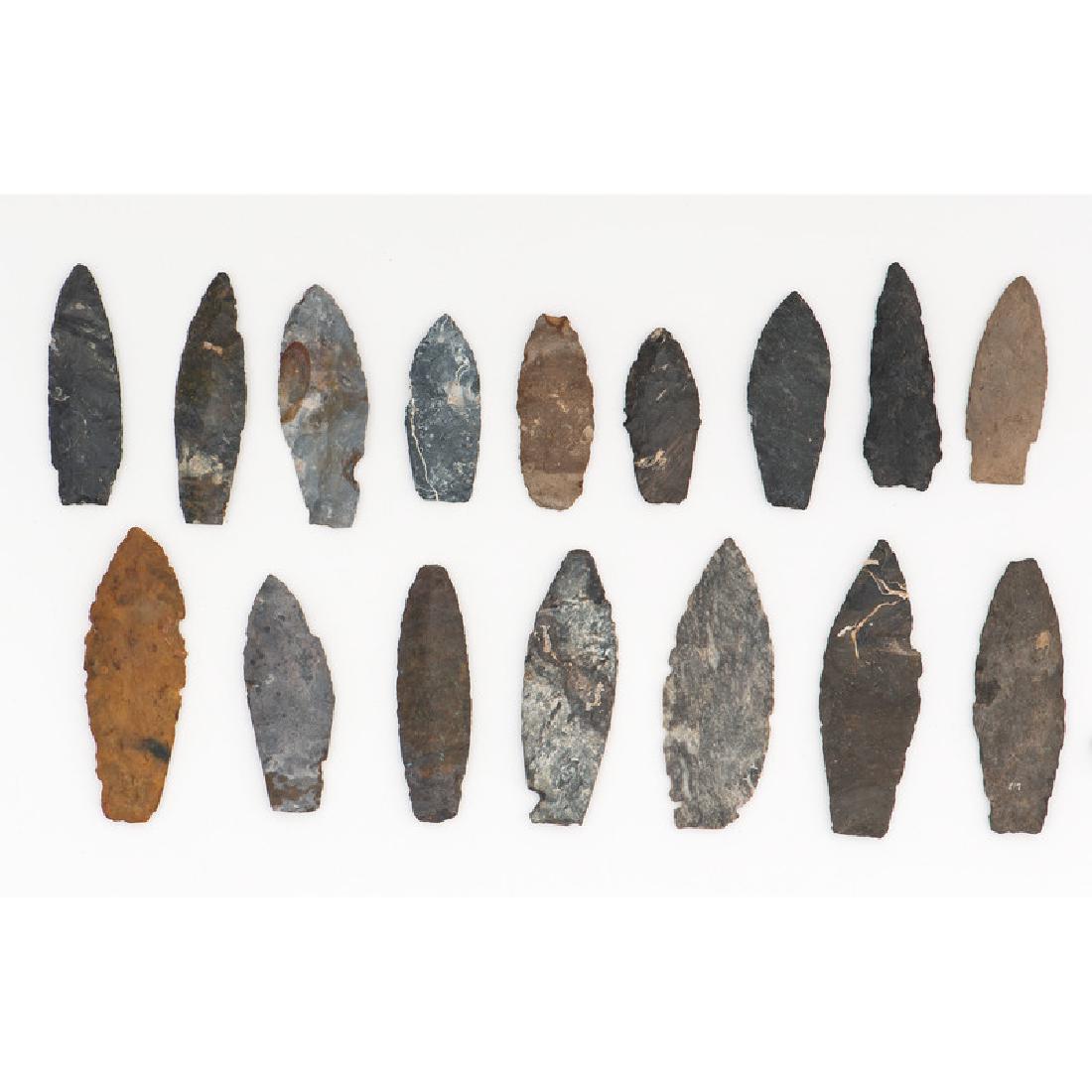 Frame of Paleo Lances,: Frame of Paleo Lances, From the Collection of Jon Anspaugh, Wapakoneta, Ohio Paleo Indian Period, 13,000-7000 B.C. lot of 16, longest 4-1/8 in.