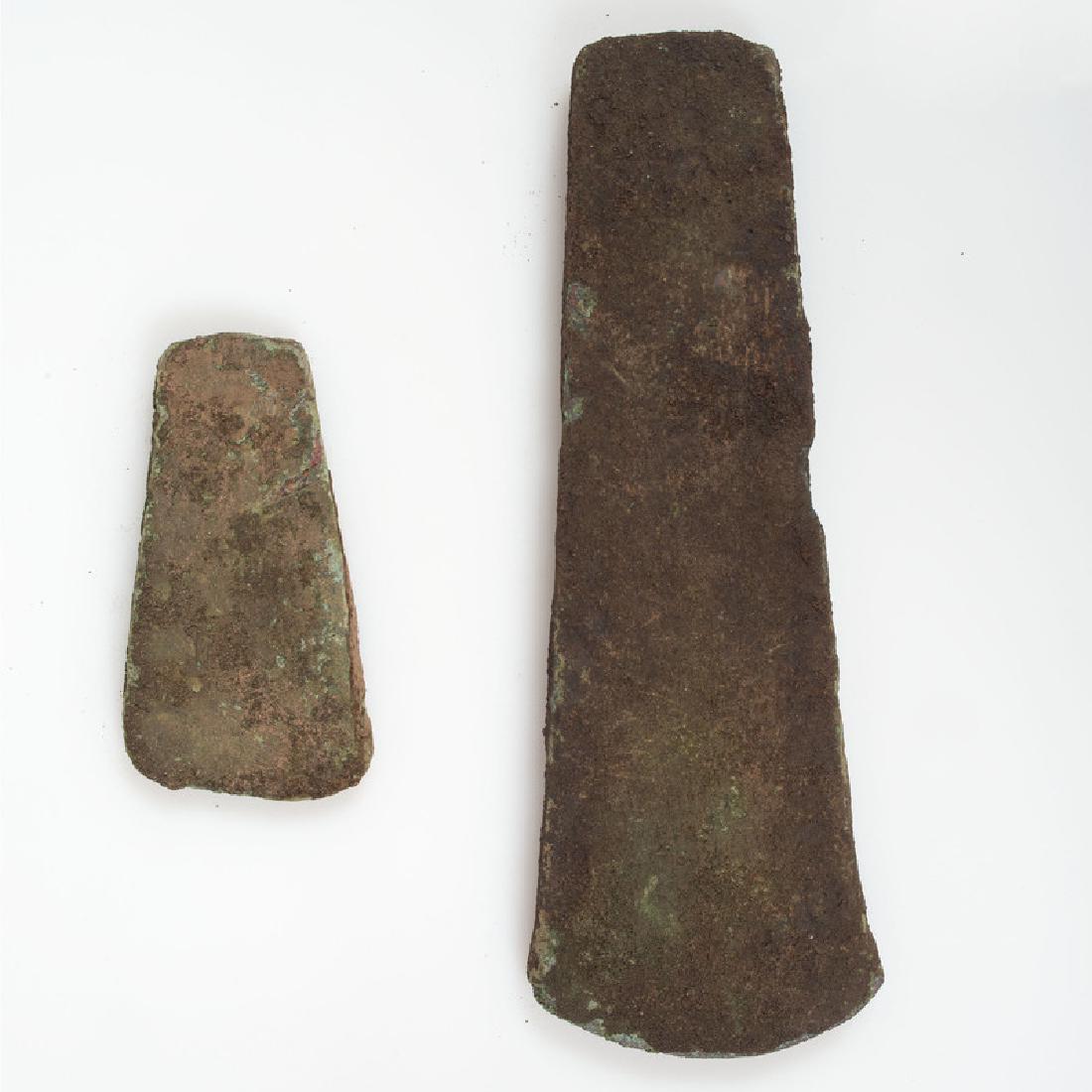 A Pair of Hopewell Copper Celts: From the Collection of Roger "Buzzy" Mussatti, Michigan Hopewell Culture, Middle Woodland Period, 200 B.C. - A.D. 400 Keweenaw County, Michigan lot of 2, longest 5 in.