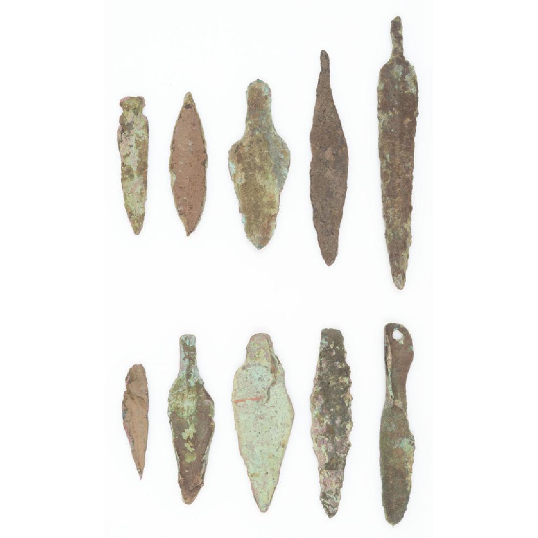 Old Copper Culture Projectile Points: From the Collection of Roger "Buzzy" Mussatti, Michigan Old Copper Culture, 7000-3000 B.C. Vilas County, Wisconsin / Gogebic County, Michigan border lot of 10, longest 4.75 in.