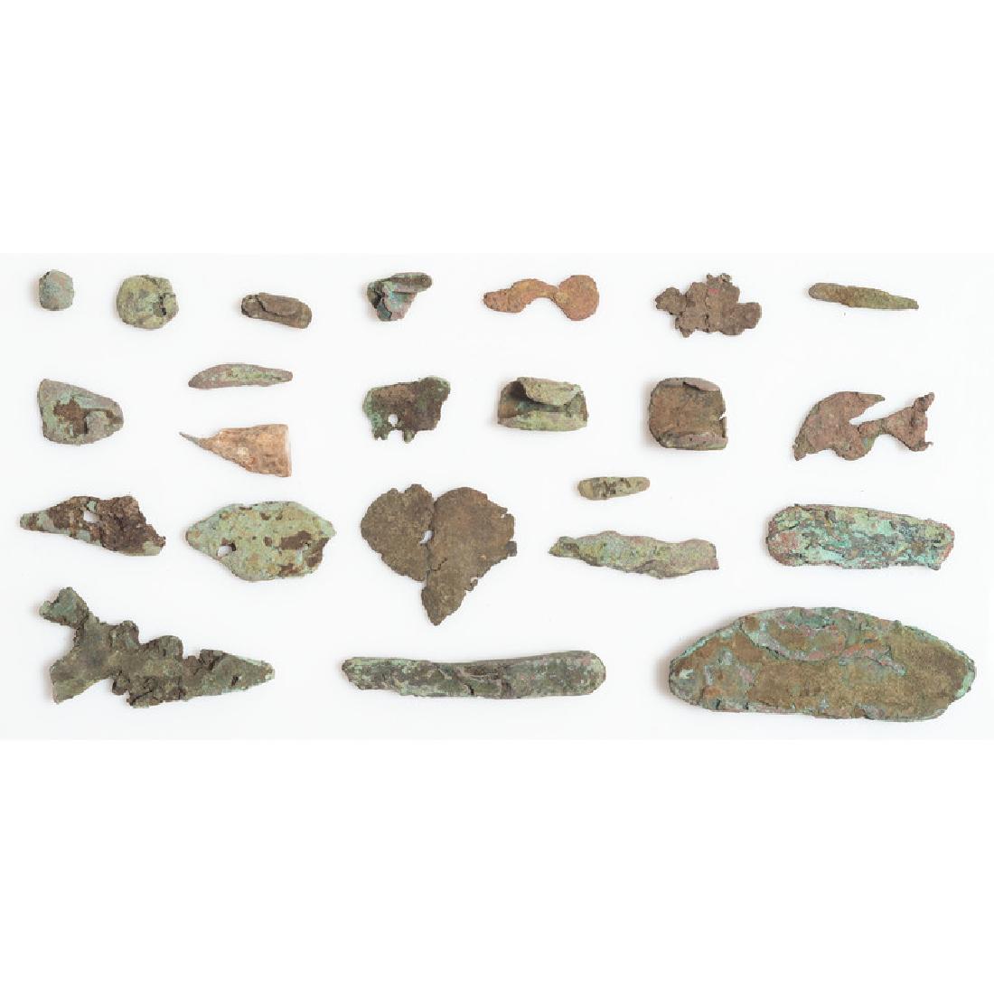 A Group of Old Copper Culture Preforms: From the Collection of Roger "Buzzy" Mussatti, Michigan Old Copper Culture, 7000-3000 B.C. Keweenaw County, Michigan lot of 23, longest 4 in.